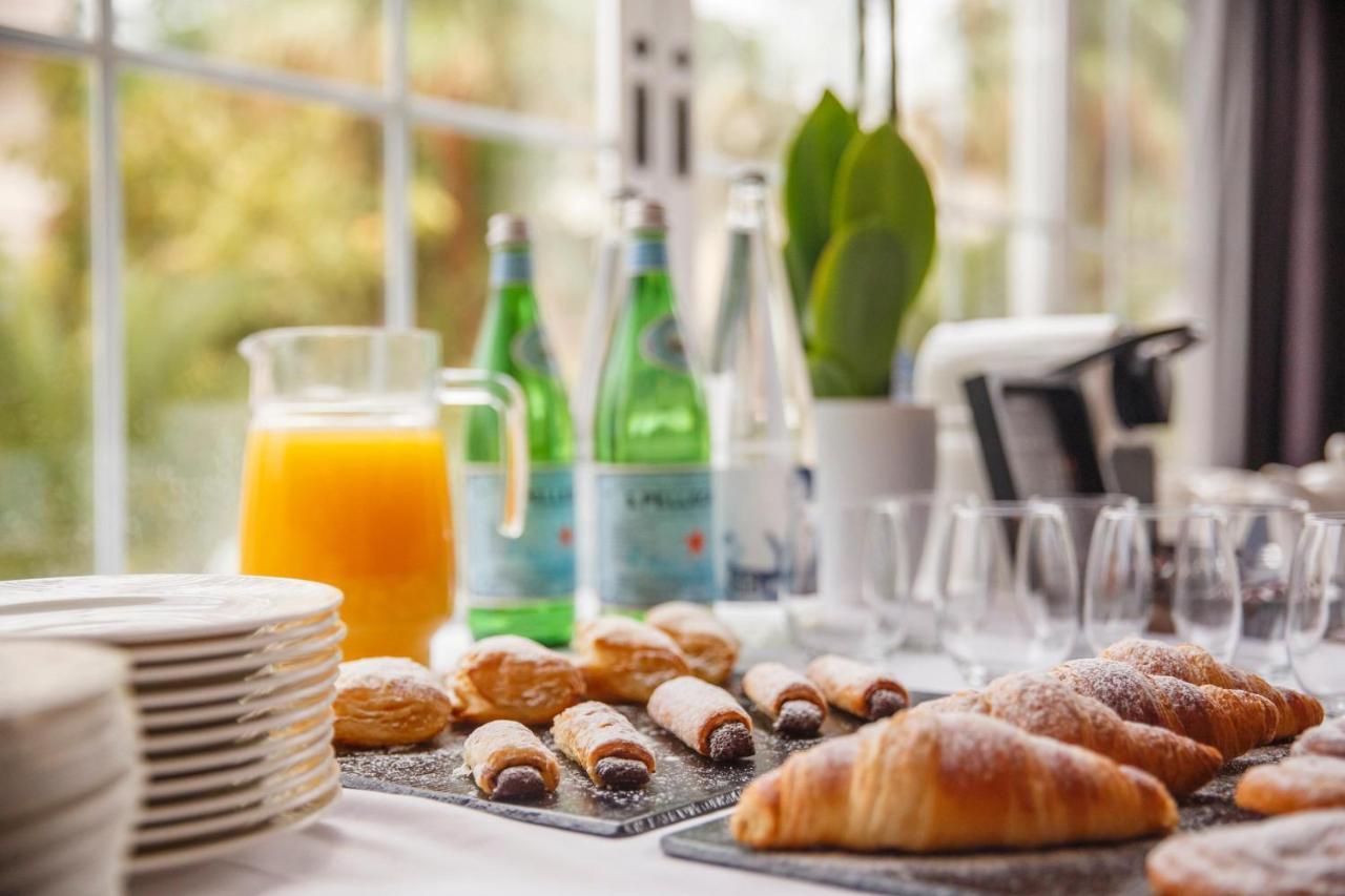 加伦达纯盐酒店 - 仅限成人 帕尔马海滩 外观 照片 A continental breakfast